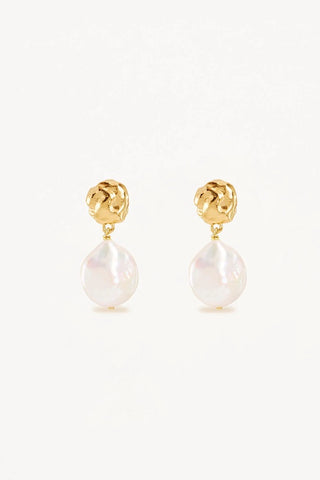 Adorn yourself in our Endless Grace Pearl Drop Earrings as a reminder to allow yourself grace to grow into the person you were meant to be.